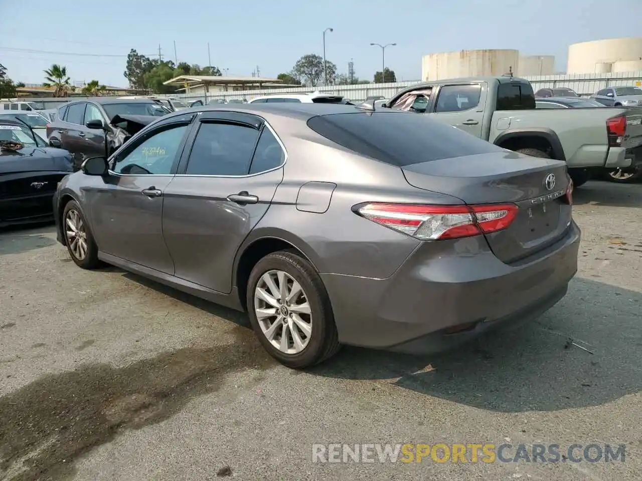 3 Photograph of a damaged car 4T1B11HK4KU759002 TOYOTA CAMRY 2019