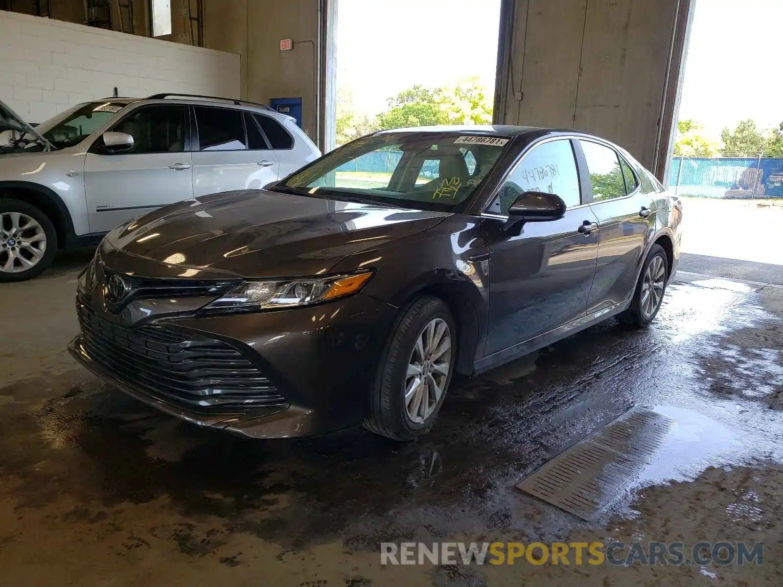 2 Photograph of a damaged car 4T1B11HK4KU760926 TOYOTA CAMRY 2019