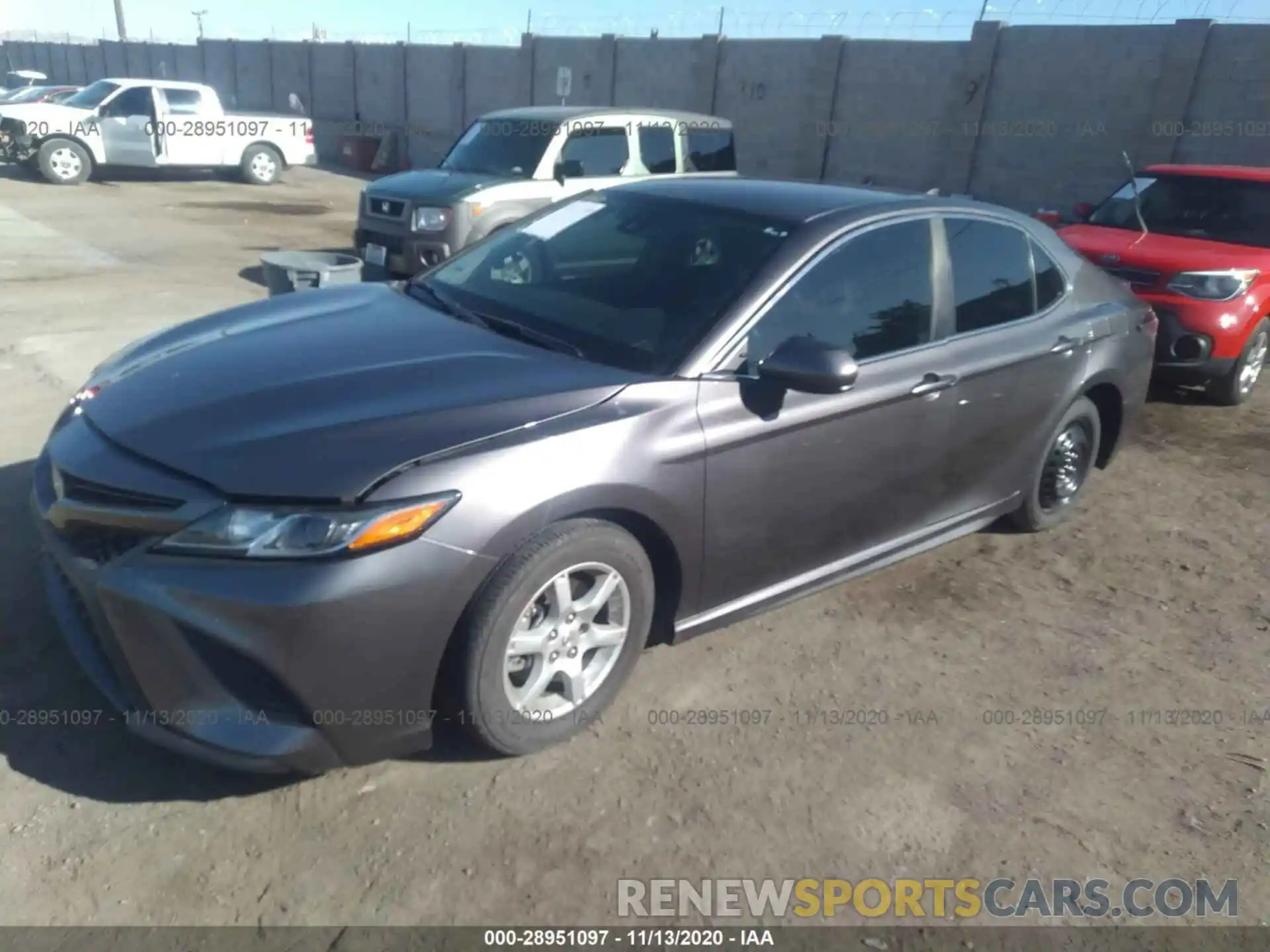 2 Photograph of a damaged car 4T1B11HK4KU764071 TOYOTA CAMRY 2019