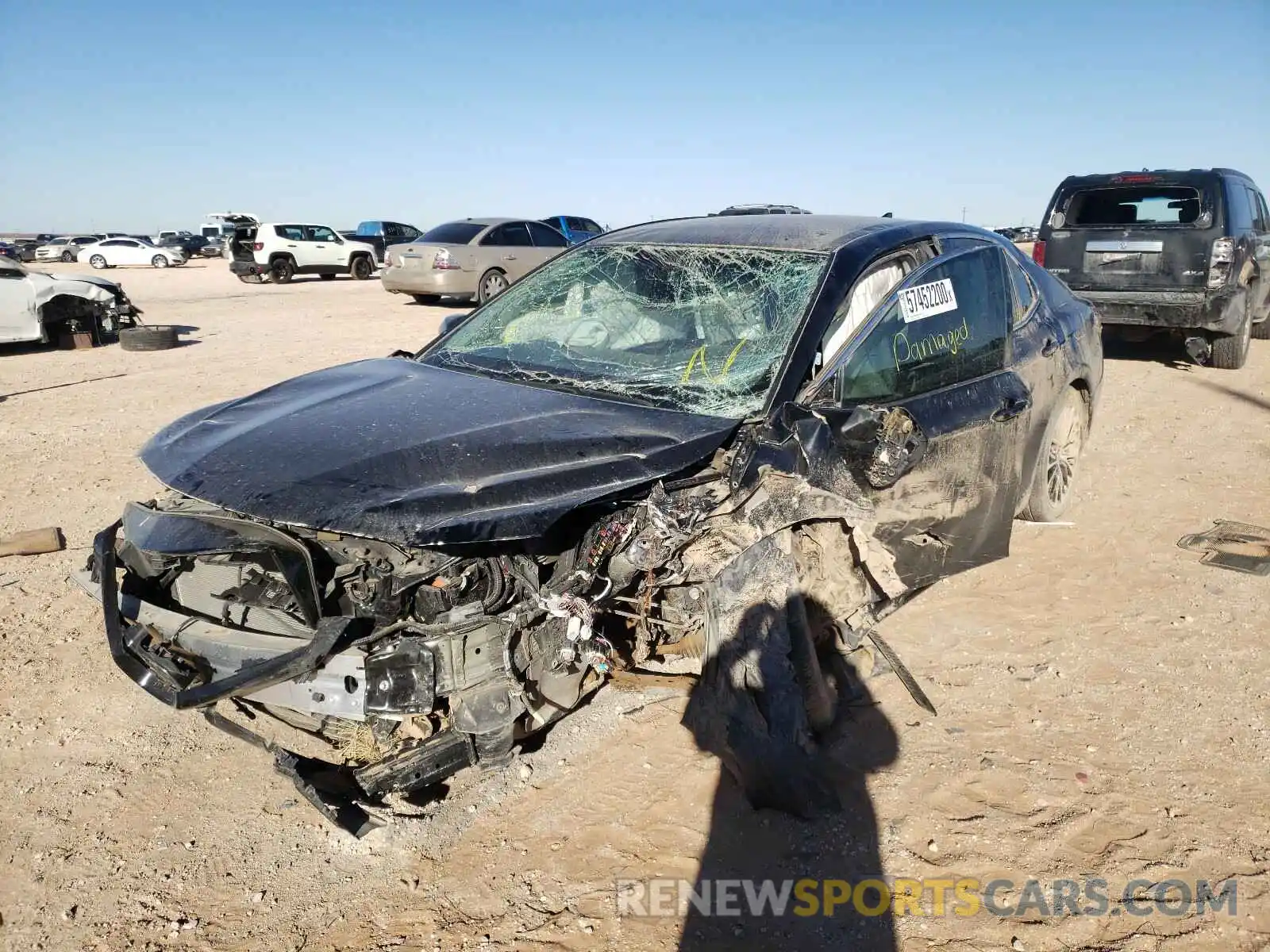 2 Photograph of a damaged car 4T1B11HK4KU765401 TOYOTA CAMRY 2019