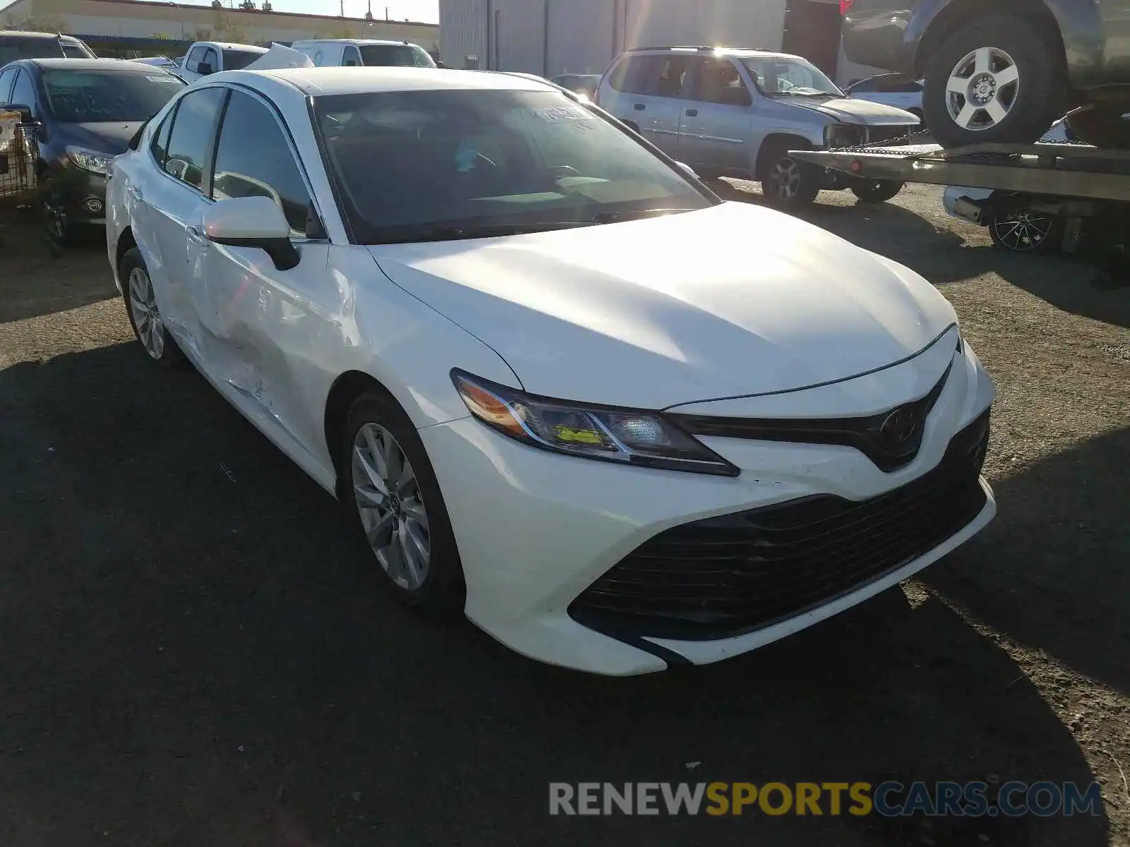 1 Photograph of a damaged car 4T1B11HK4KU765687 TOYOTA CAMRY 2019