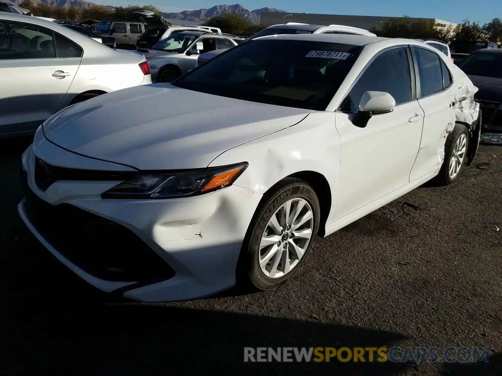 2 Photograph of a damaged car 4T1B11HK4KU765687 TOYOTA CAMRY 2019