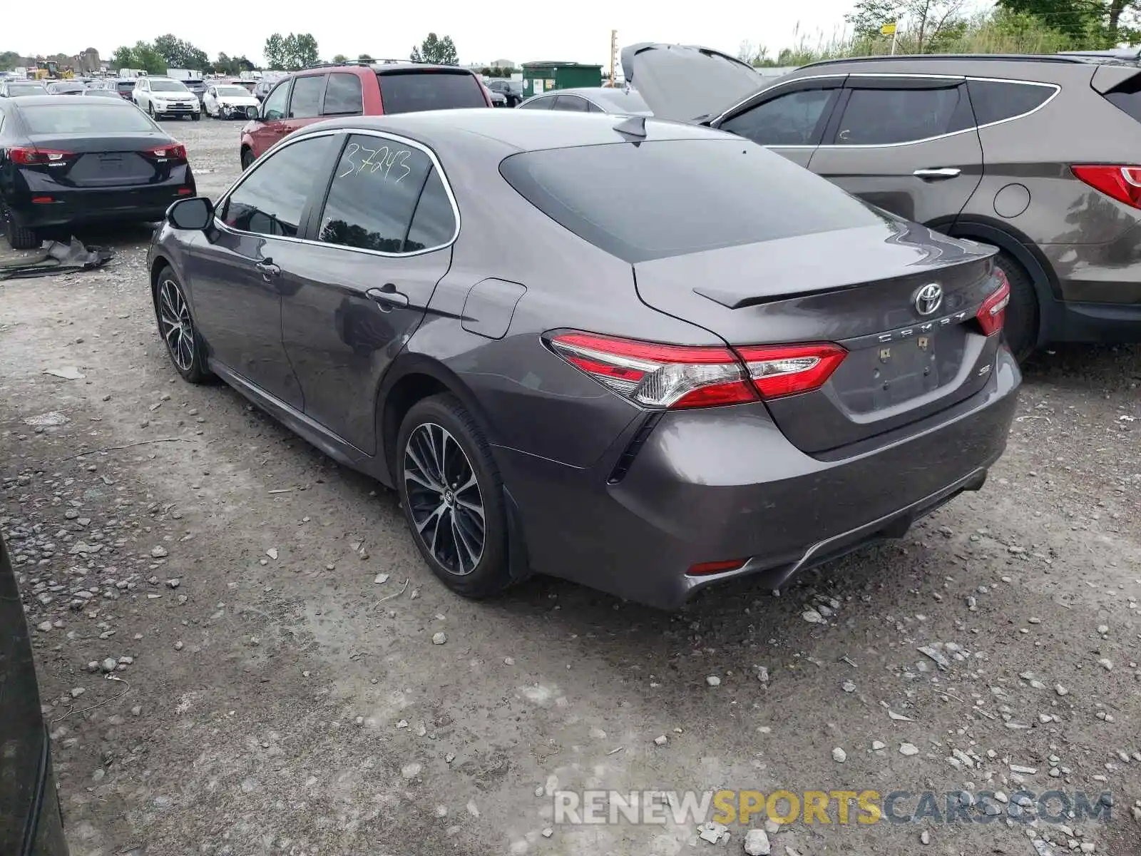 3 Photograph of a damaged car 4T1B11HK4KU768167 TOYOTA CAMRY 2019