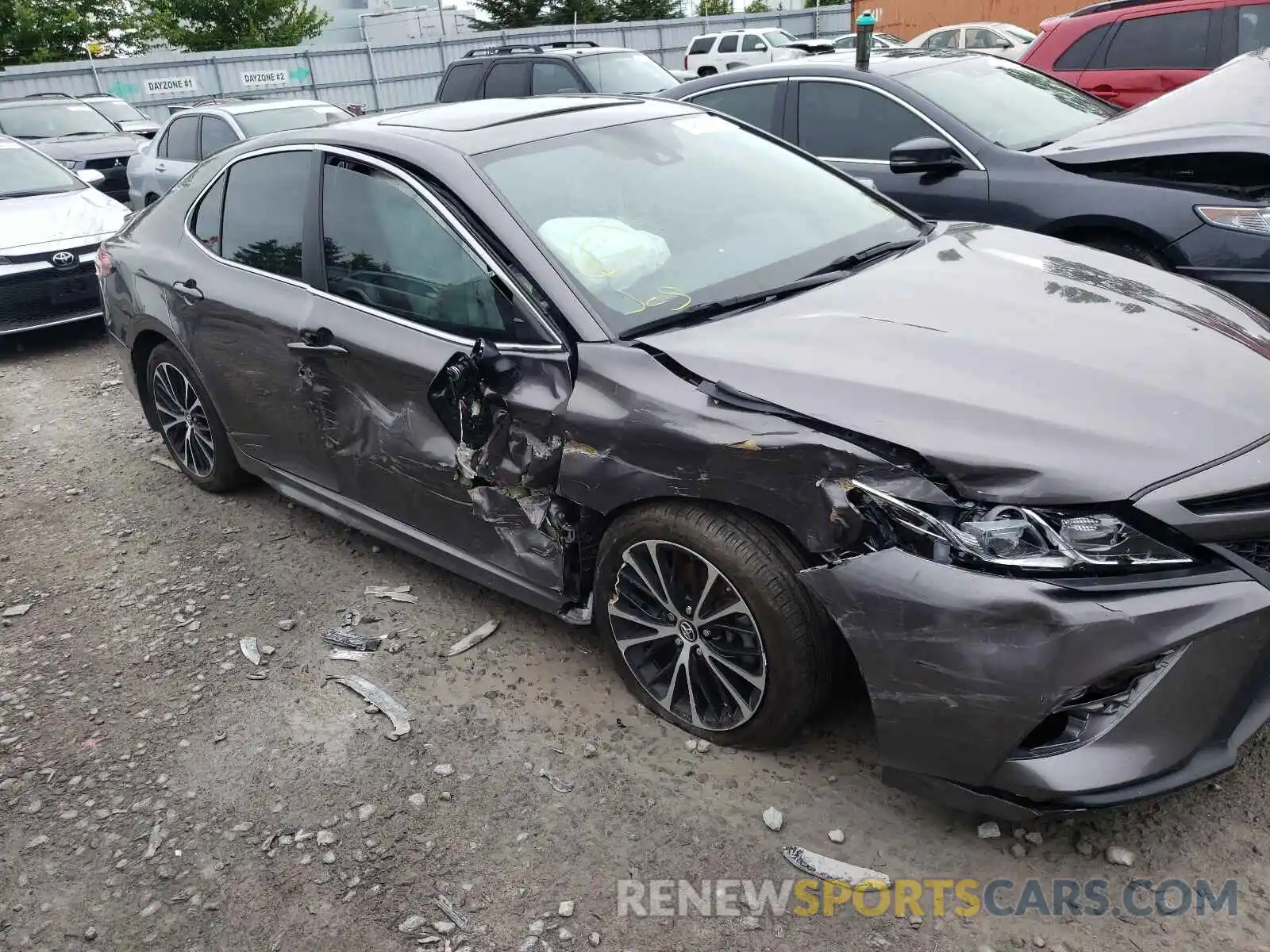 9 Photograph of a damaged car 4T1B11HK4KU768167 TOYOTA CAMRY 2019