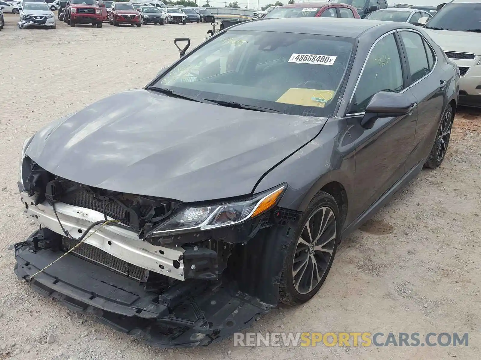 2 Photograph of a damaged car 4T1B11HK4KU779685 TOYOTA CAMRY 2019