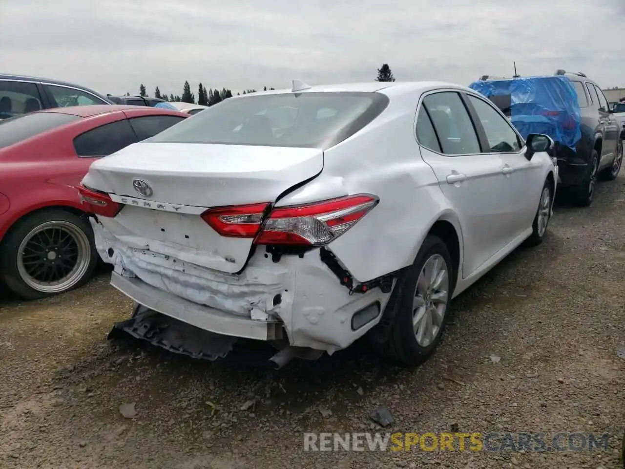 4 Photograph of a damaged car 4T1B11HK4KU789570 TOYOTA CAMRY 2019