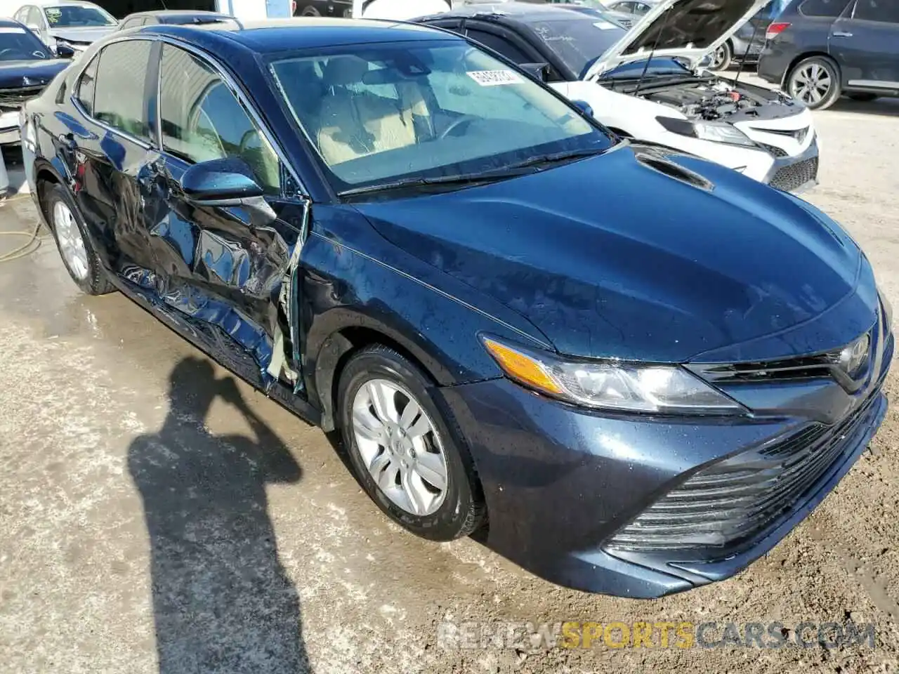 4 Photograph of a damaged car 4T1B11HK4KU803144 TOYOTA CAMRY 2019