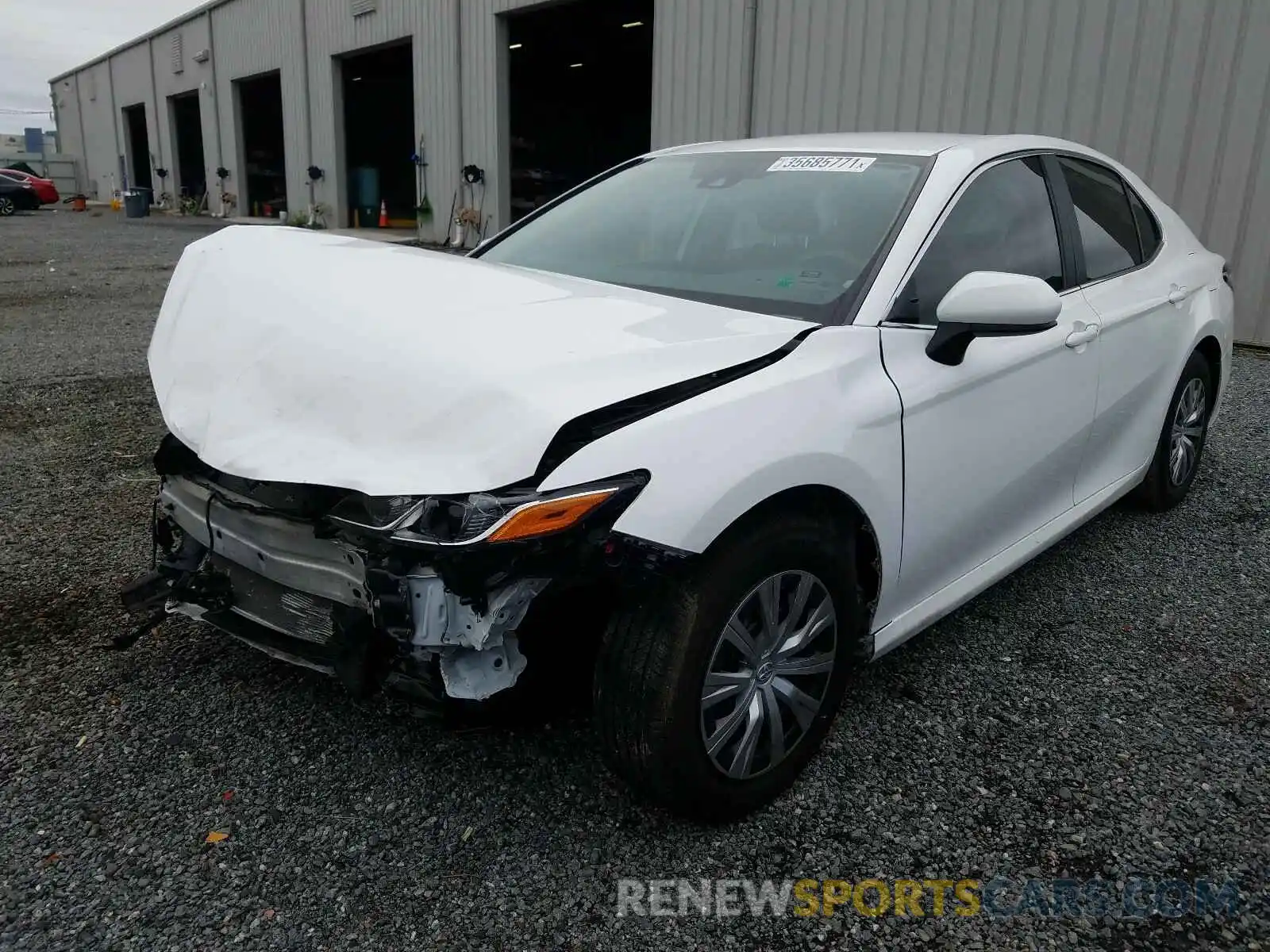 2 Photograph of a damaged car 4T1B11HK4KU810143 TOYOTA CAMRY 2019