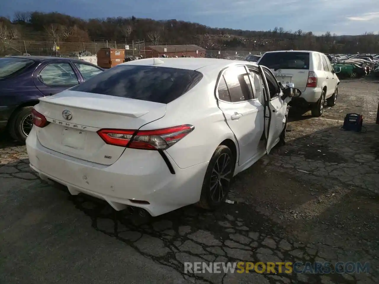 4 Photograph of a damaged car 4T1B11HK4KU811907 TOYOTA CAMRY 2019