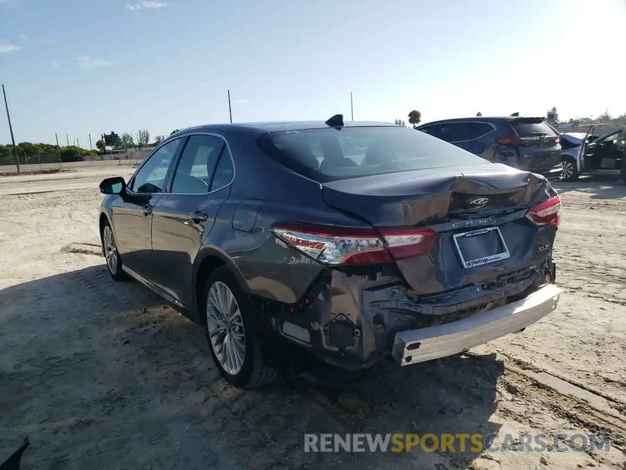 3 Photograph of a damaged car 4T1B11HK4KU812815 TOYOTA CAMRY 2019