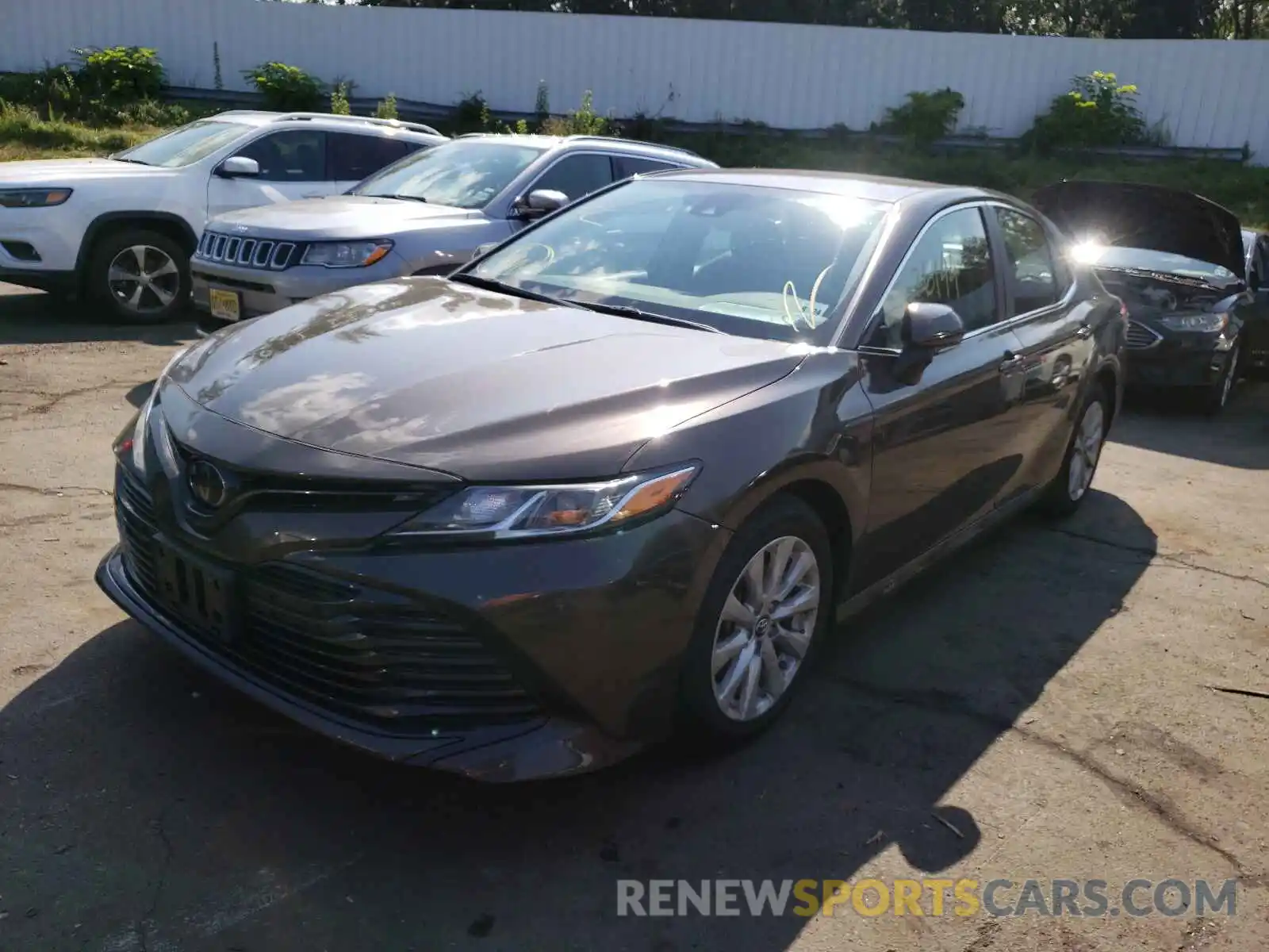 2 Photograph of a damaged car 4T1B11HK4KU823653 TOYOTA CAMRY 2019