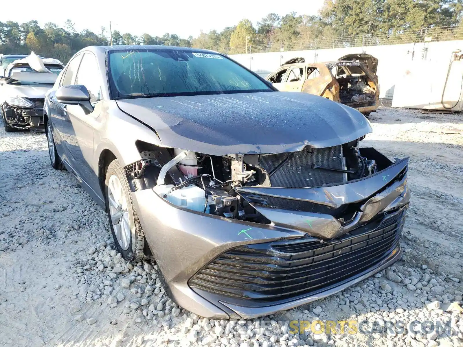 1 Photograph of a damaged car 4T1B11HK4KU826584 TOYOTA CAMRY 2019