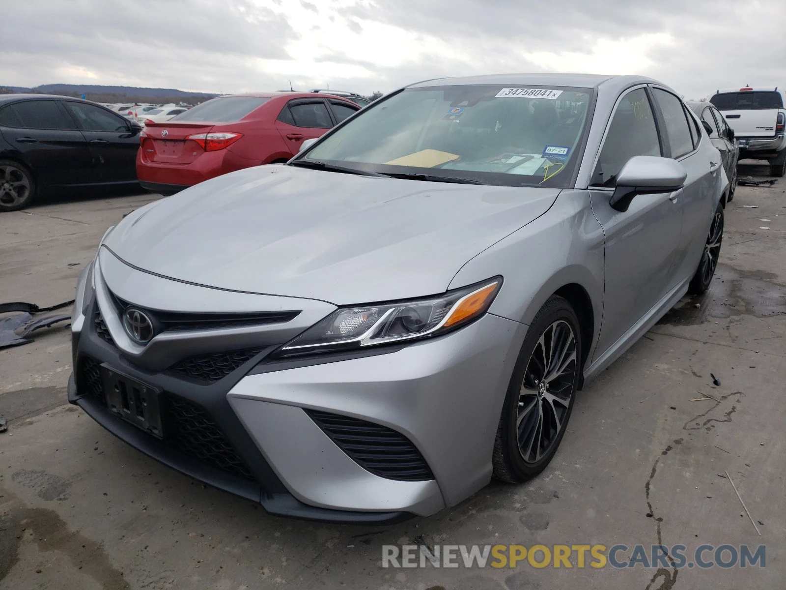 2 Photograph of a damaged car 4T1B11HK4KU832000 TOYOTA CAMRY 2019