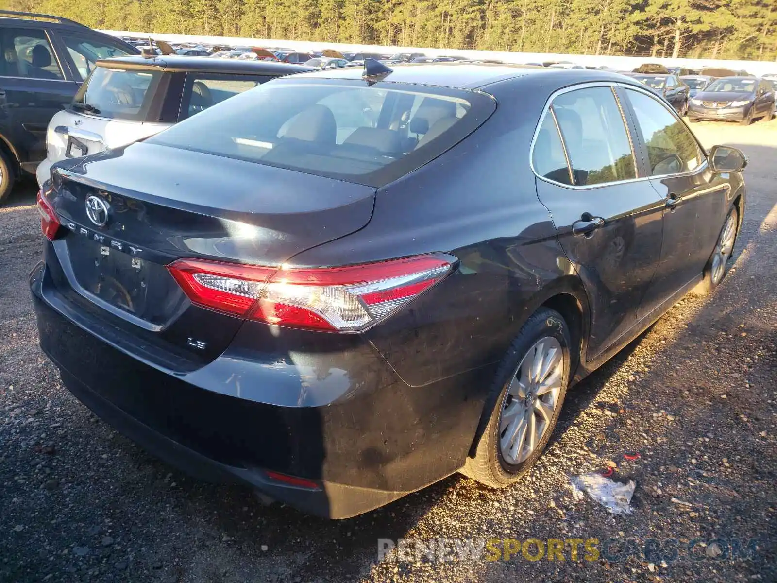 4 Photograph of a damaged car 4T1B11HK4KU832031 TOYOTA CAMRY 2019