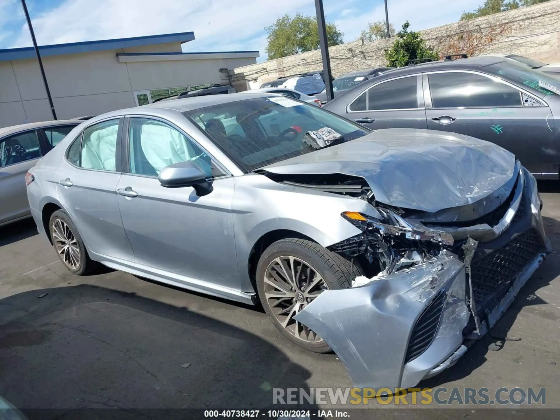 14 Photograph of a damaged car 4T1B11HK4KU841263 TOYOTA CAMRY 2019