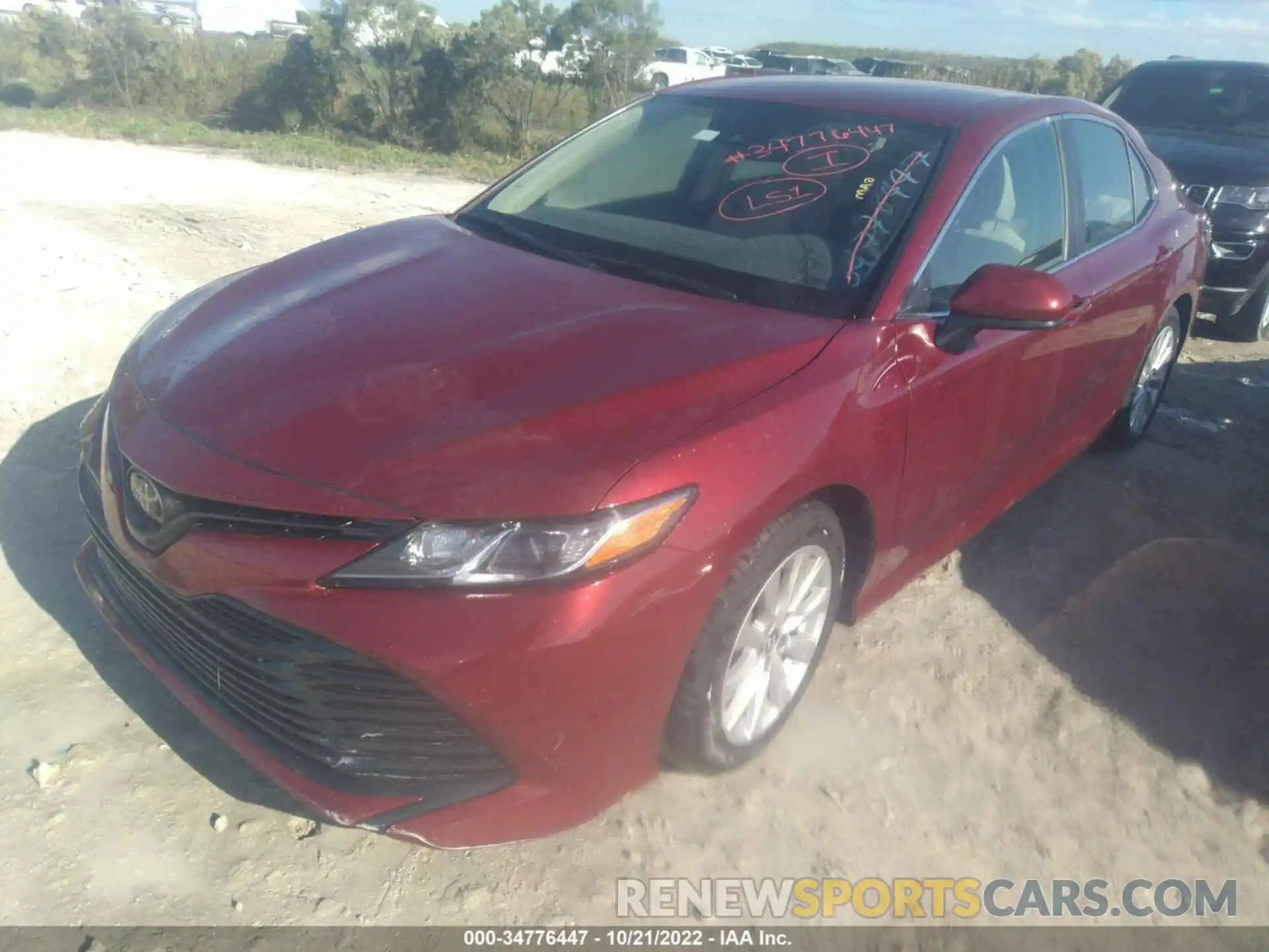 2 Photograph of a damaged car 4T1B11HK4KU856040 TOYOTA CAMRY 2019