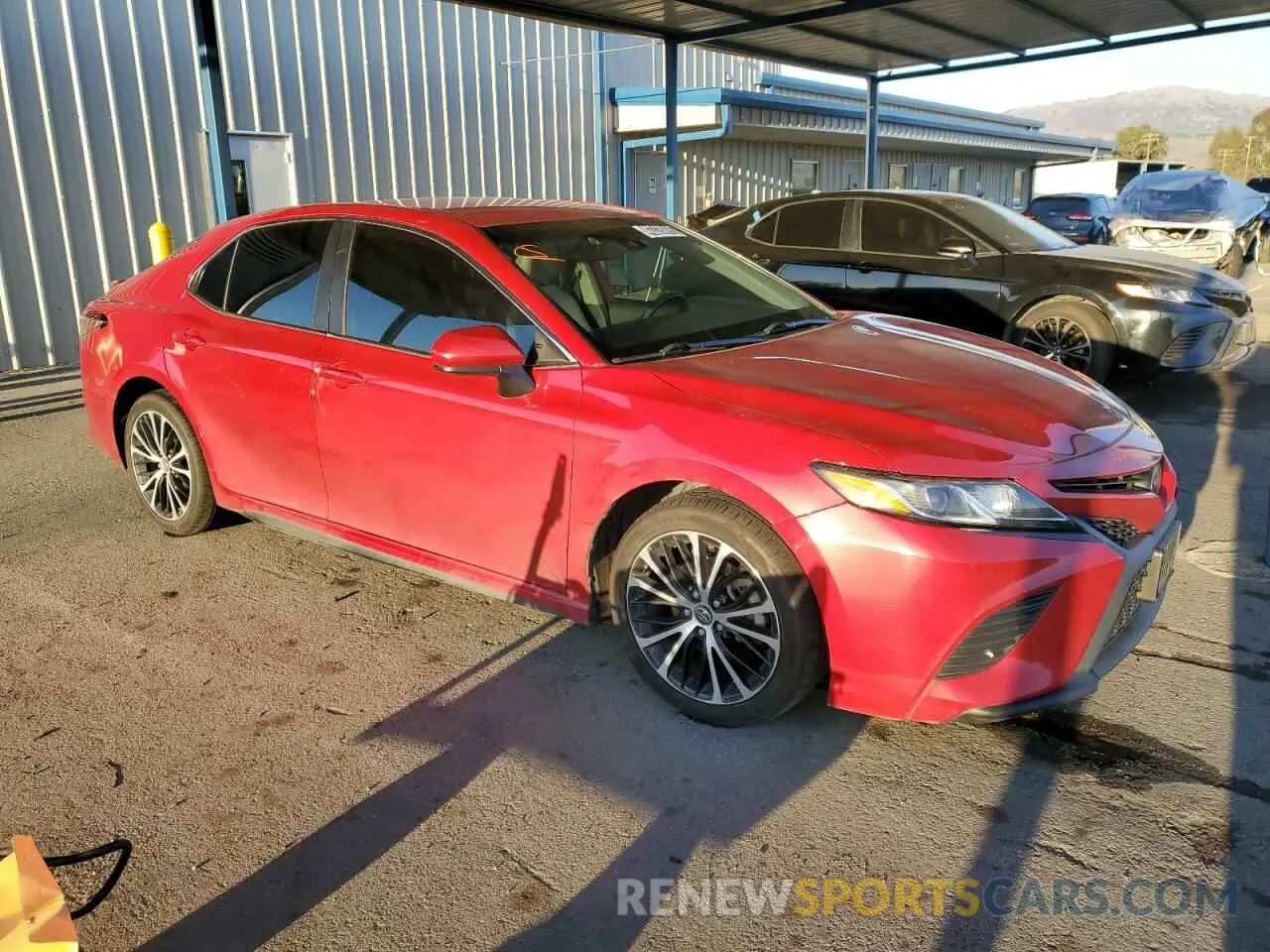 4 Photograph of a damaged car 4T1B11HK5KU200574 TOYOTA CAMRY 2019