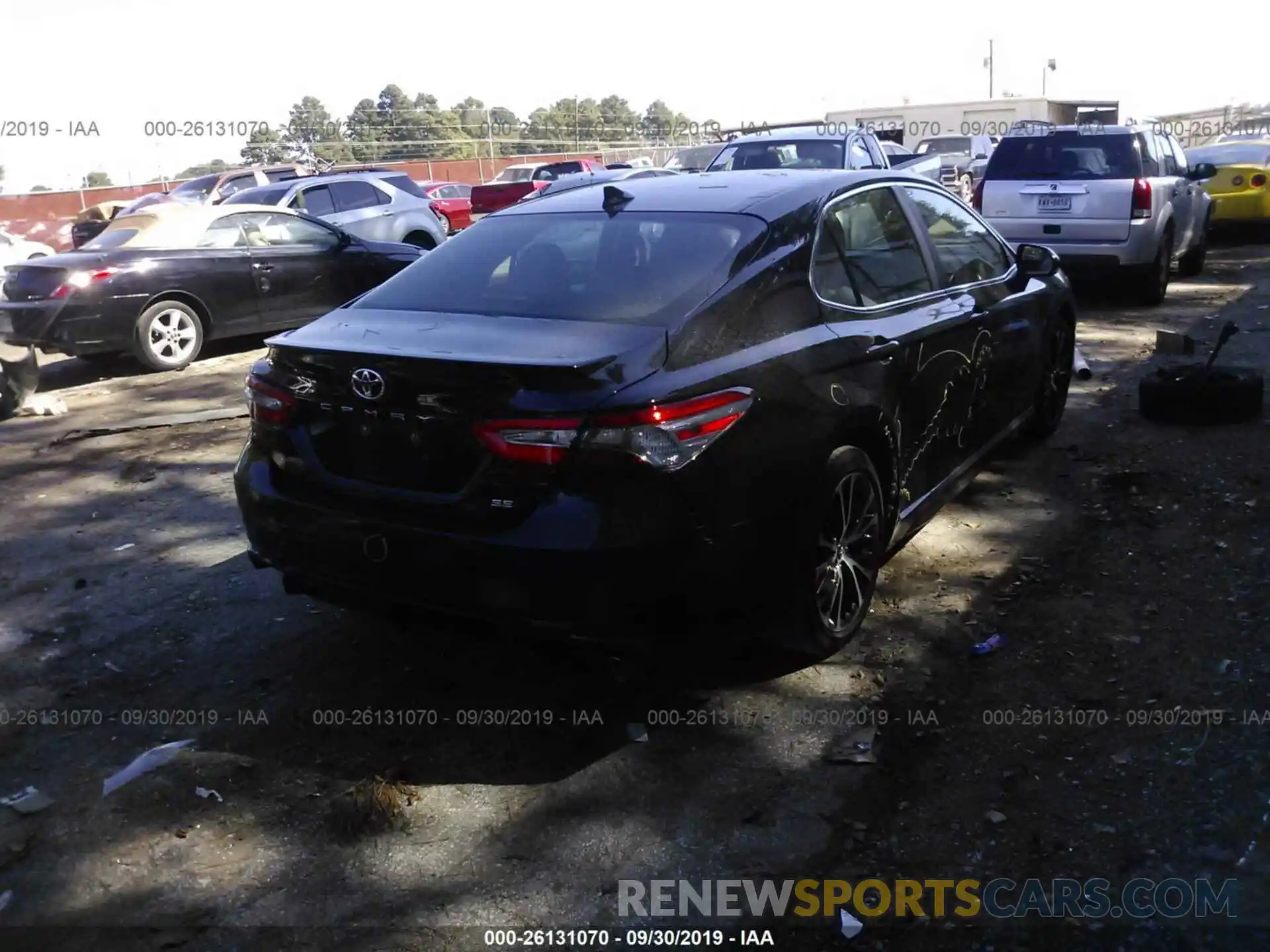 4 Photograph of a damaged car 4T1B11HK5KU200669 TOYOTA CAMRY 2019