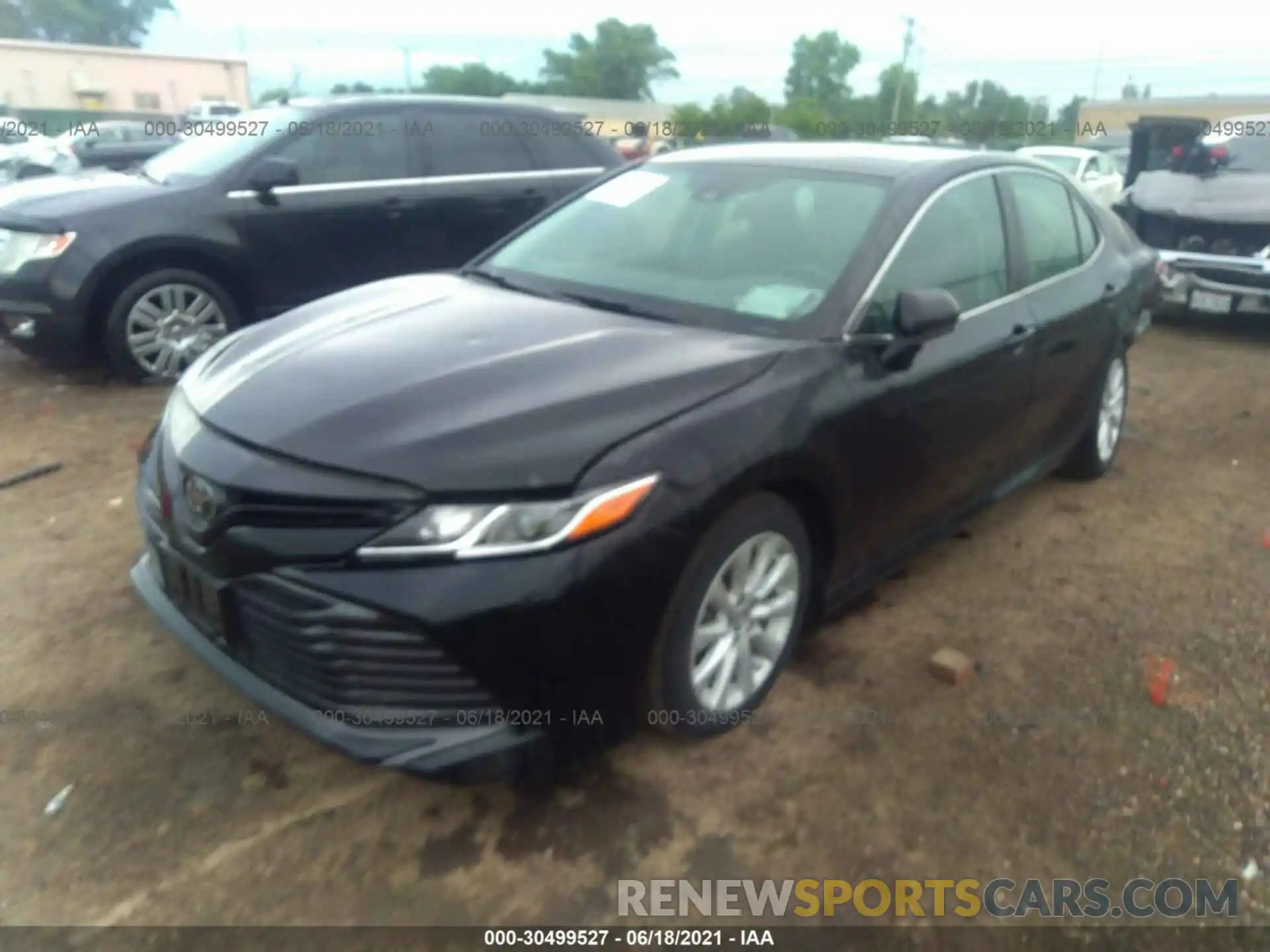 2 Photograph of a damaged car 4T1B11HK5KU201045 TOYOTA CAMRY 2019