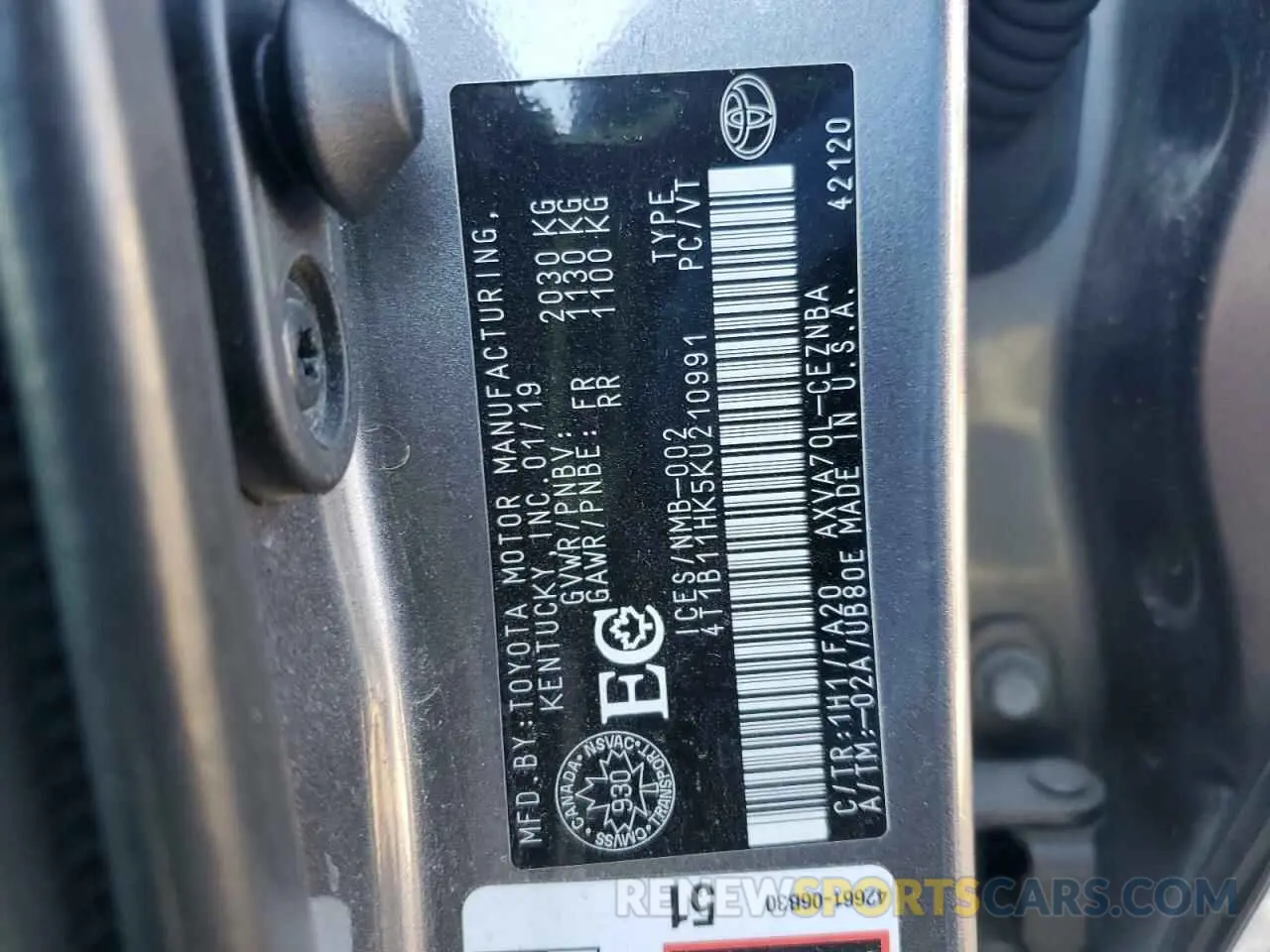12 Photograph of a damaged car 4T1B11HK5KU210991 TOYOTA CAMRY 2019