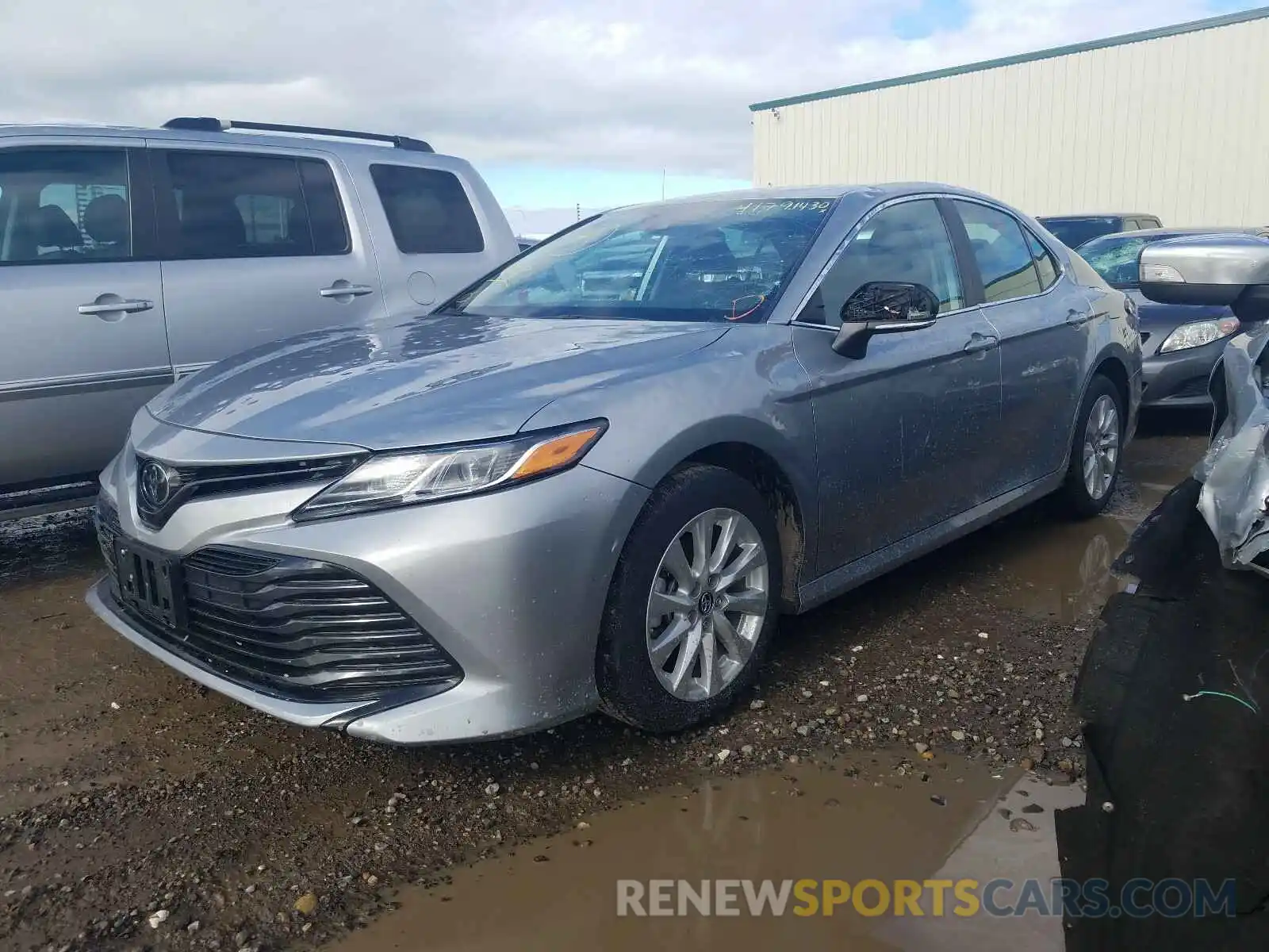 2 Photograph of a damaged car 4T1B11HK5KU211316 TOYOTA CAMRY 2019