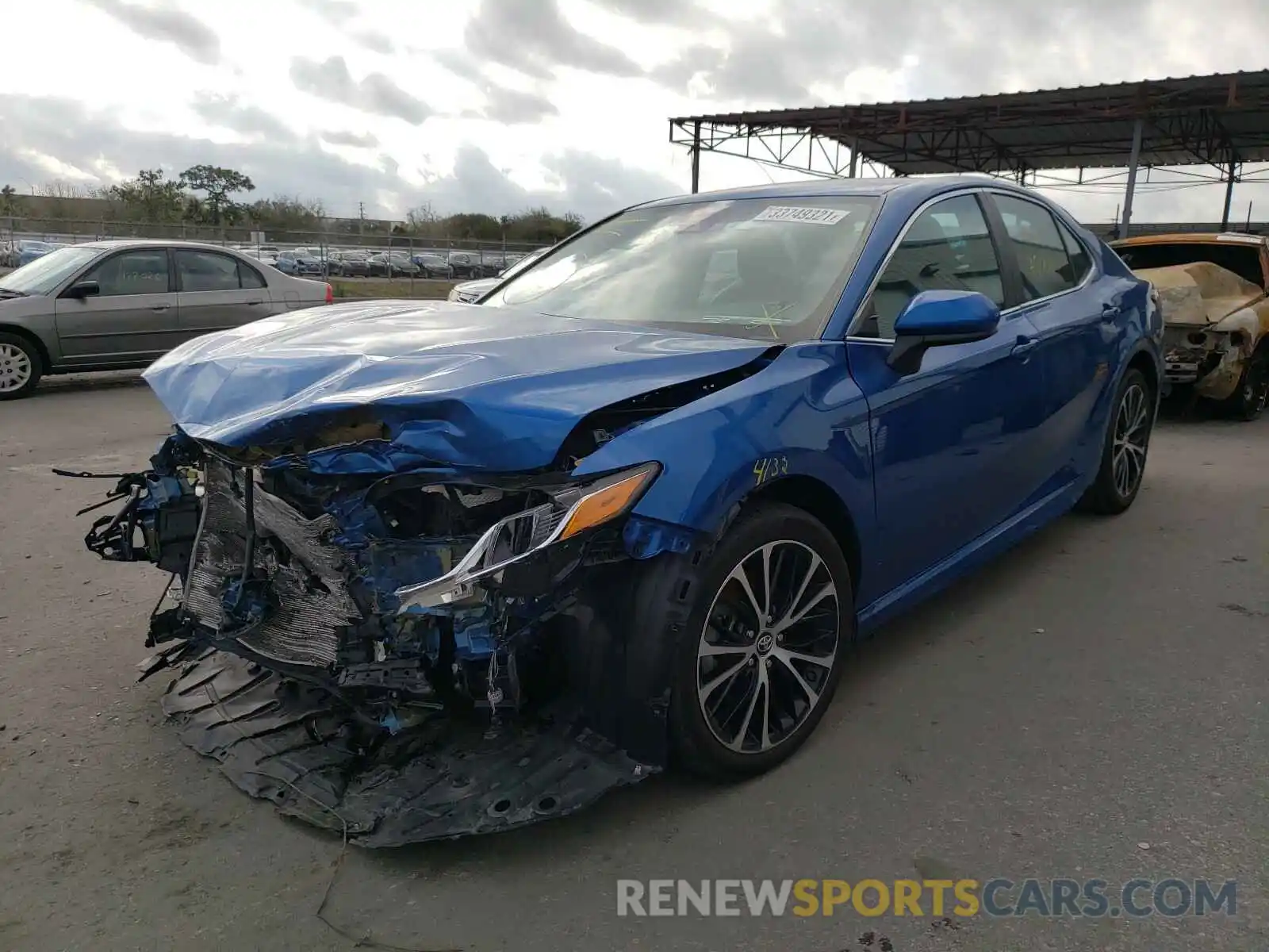 2 Photograph of a damaged car 4T1B11HK5KU216340 TOYOTA CAMRY 2019