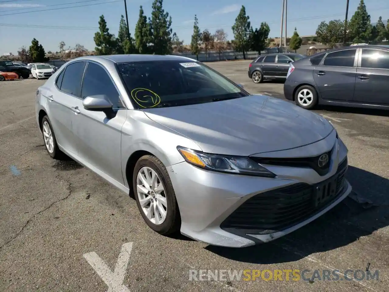 1 Photograph of a damaged car 4T1B11HK5KU216967 TOYOTA CAMRY 2019