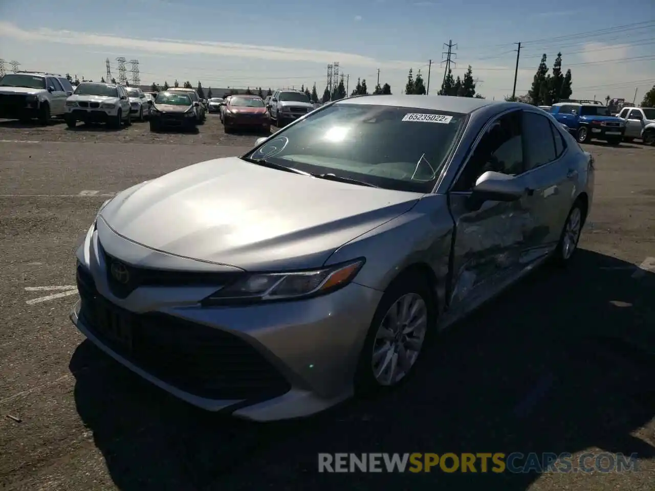 2 Photograph of a damaged car 4T1B11HK5KU216967 TOYOTA CAMRY 2019