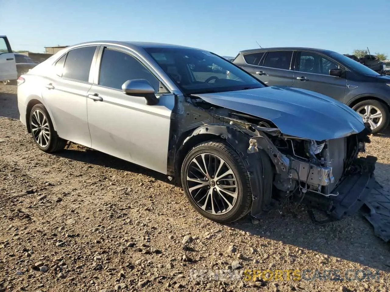 4 Photograph of a damaged car 4T1B11HK5KU223482 TOYOTA CAMRY 2019