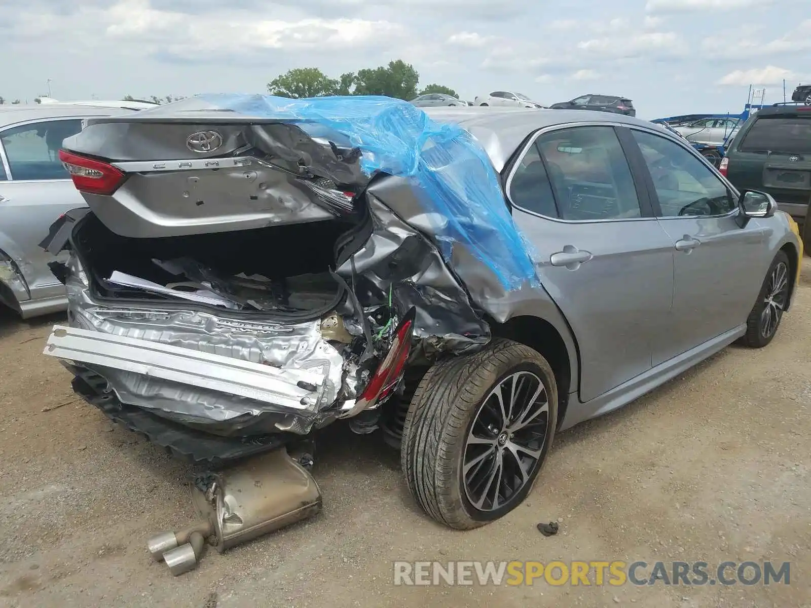 4 Photograph of a damaged car 4T1B11HK5KU231114 TOYOTA CAMRY 2019