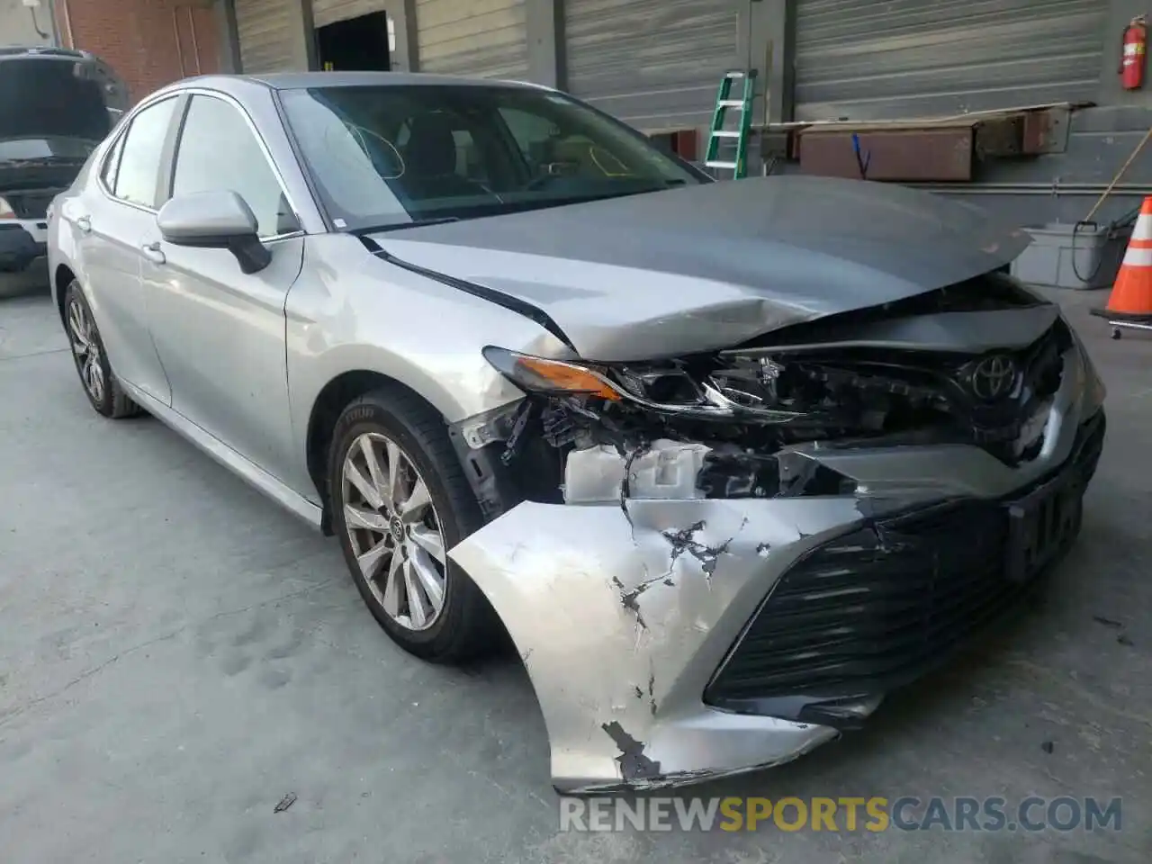 9 Photograph of a damaged car 4T1B11HK5KU242176 TOYOTA CAMRY 2019