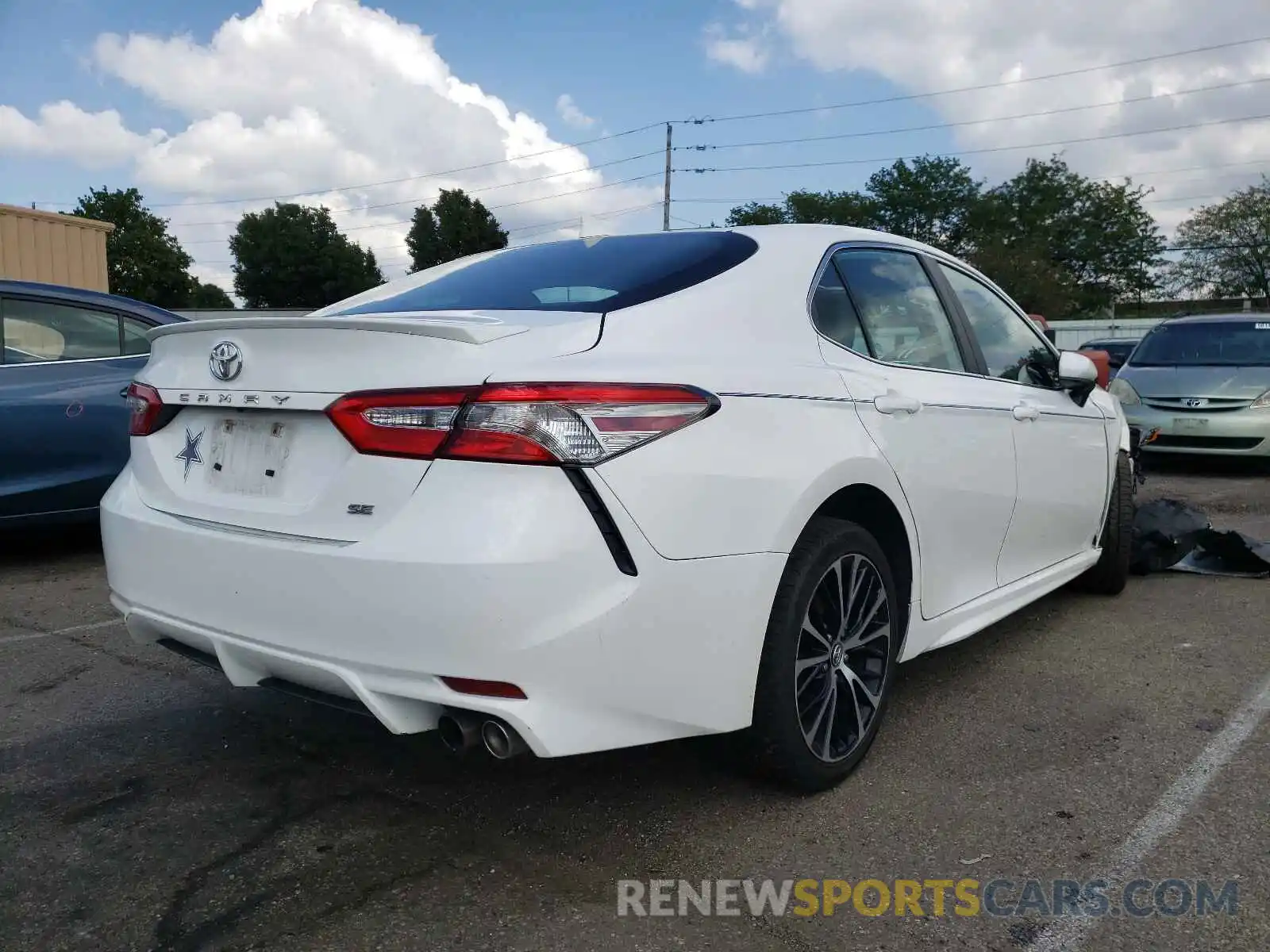 4 Photograph of a damaged car 4T1B11HK5KU245885 TOYOTA CAMRY 2019