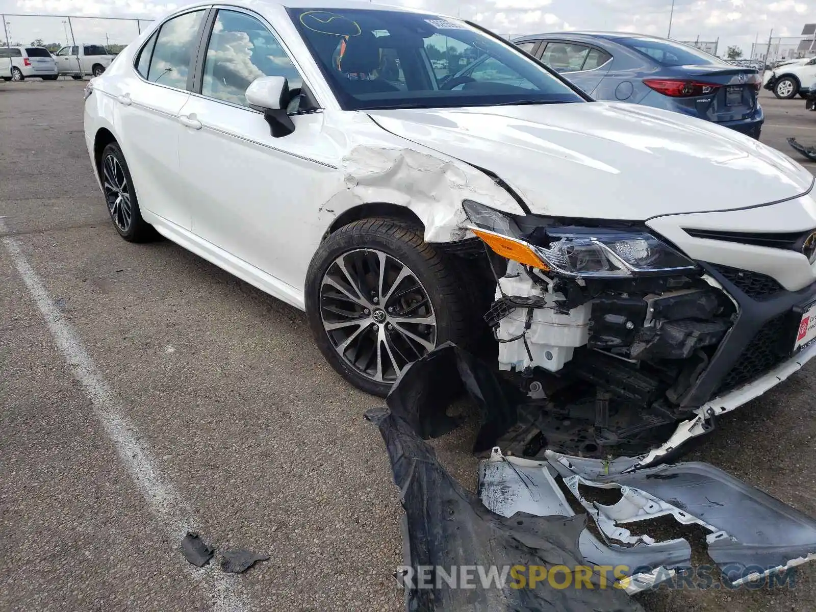 9 Photograph of a damaged car 4T1B11HK5KU245885 TOYOTA CAMRY 2019