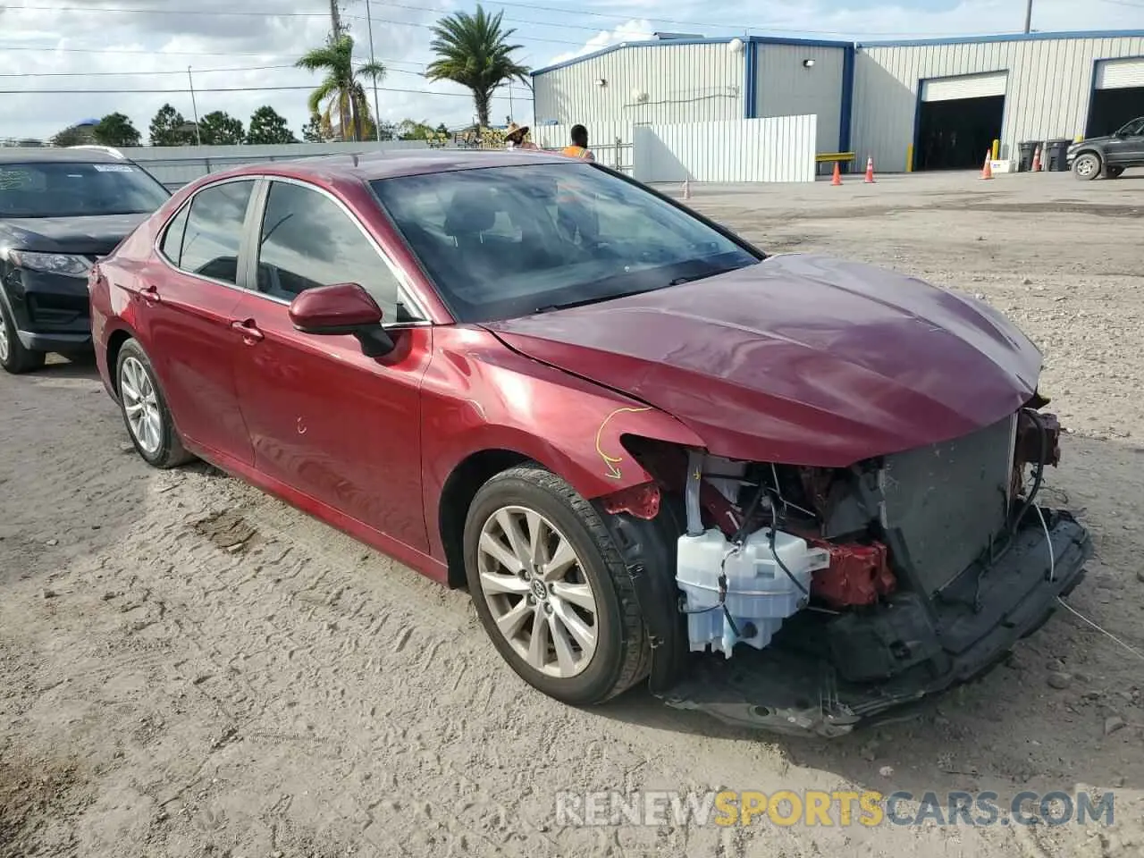 4 Photograph of a damaged car 4T1B11HK5KU250892 TOYOTA CAMRY 2019