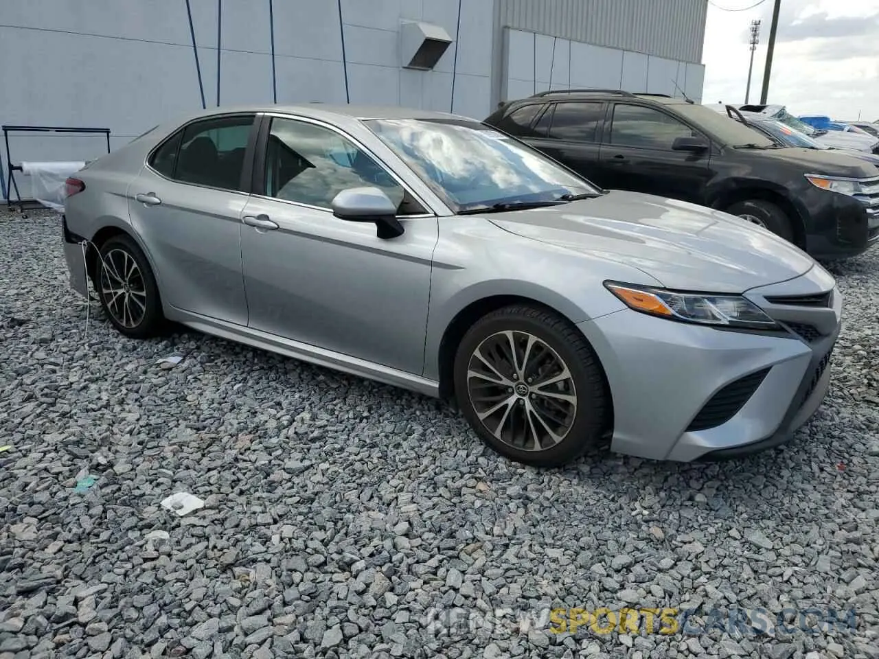 4 Photograph of a damaged car 4T1B11HK5KU255557 TOYOTA CAMRY 2019