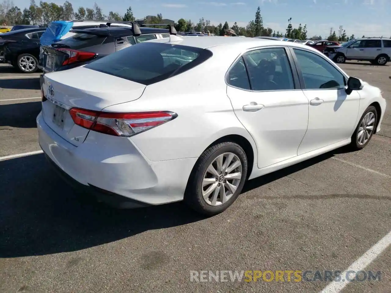 3 Photograph of a damaged car 4T1B11HK5KU255803 TOYOTA CAMRY 2019