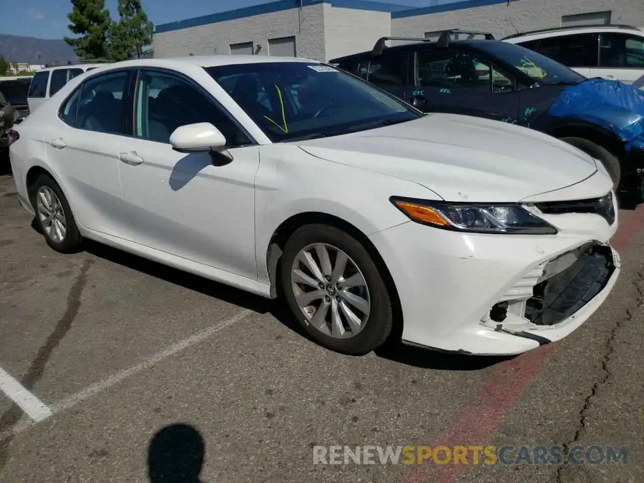 4 Photograph of a damaged car 4T1B11HK5KU255803 TOYOTA CAMRY 2019