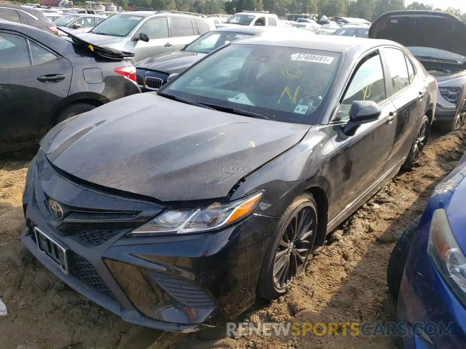 2 Photograph of a damaged car 4T1B11HK5KU263660 TOYOTA CAMRY 2019