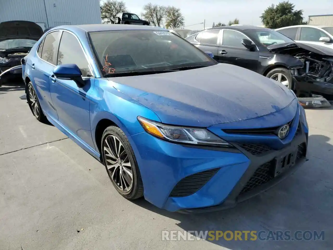 1 Photograph of a damaged car 4T1B11HK5KU282631 TOYOTA CAMRY 2019