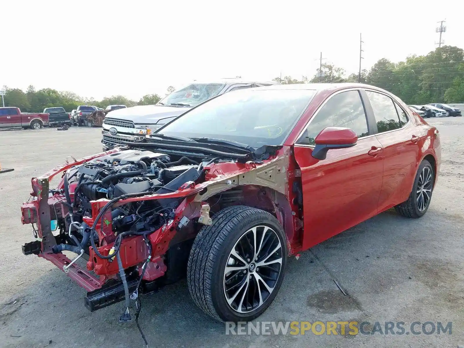 2 Photograph of a damaged car 4T1B11HK5KU283021 TOYOTA CAMRY 2019