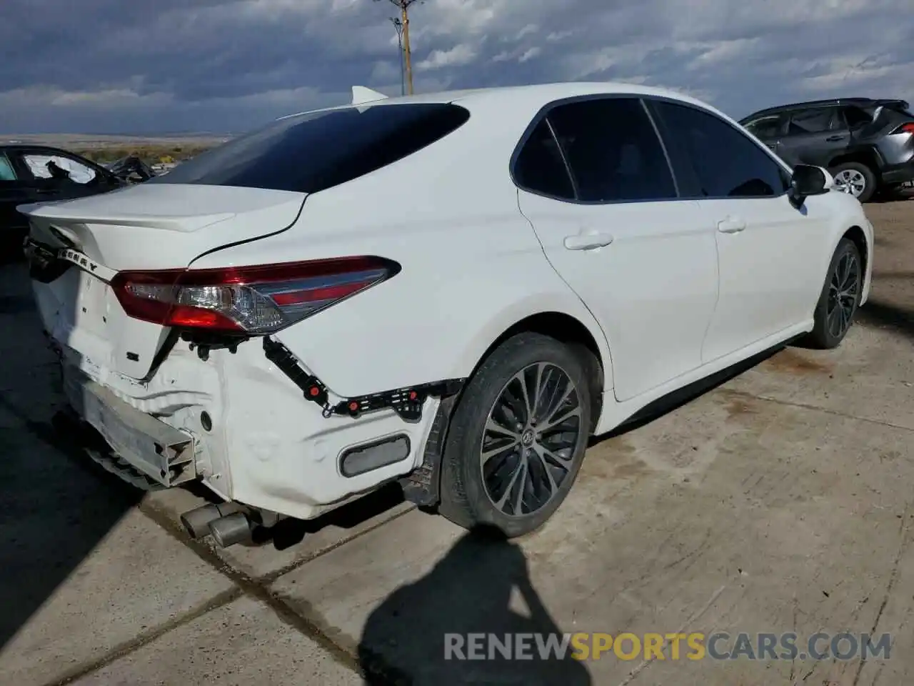 4 Photograph of a damaged car 4T1B11HK5KU283522 TOYOTA CAMRY 2019