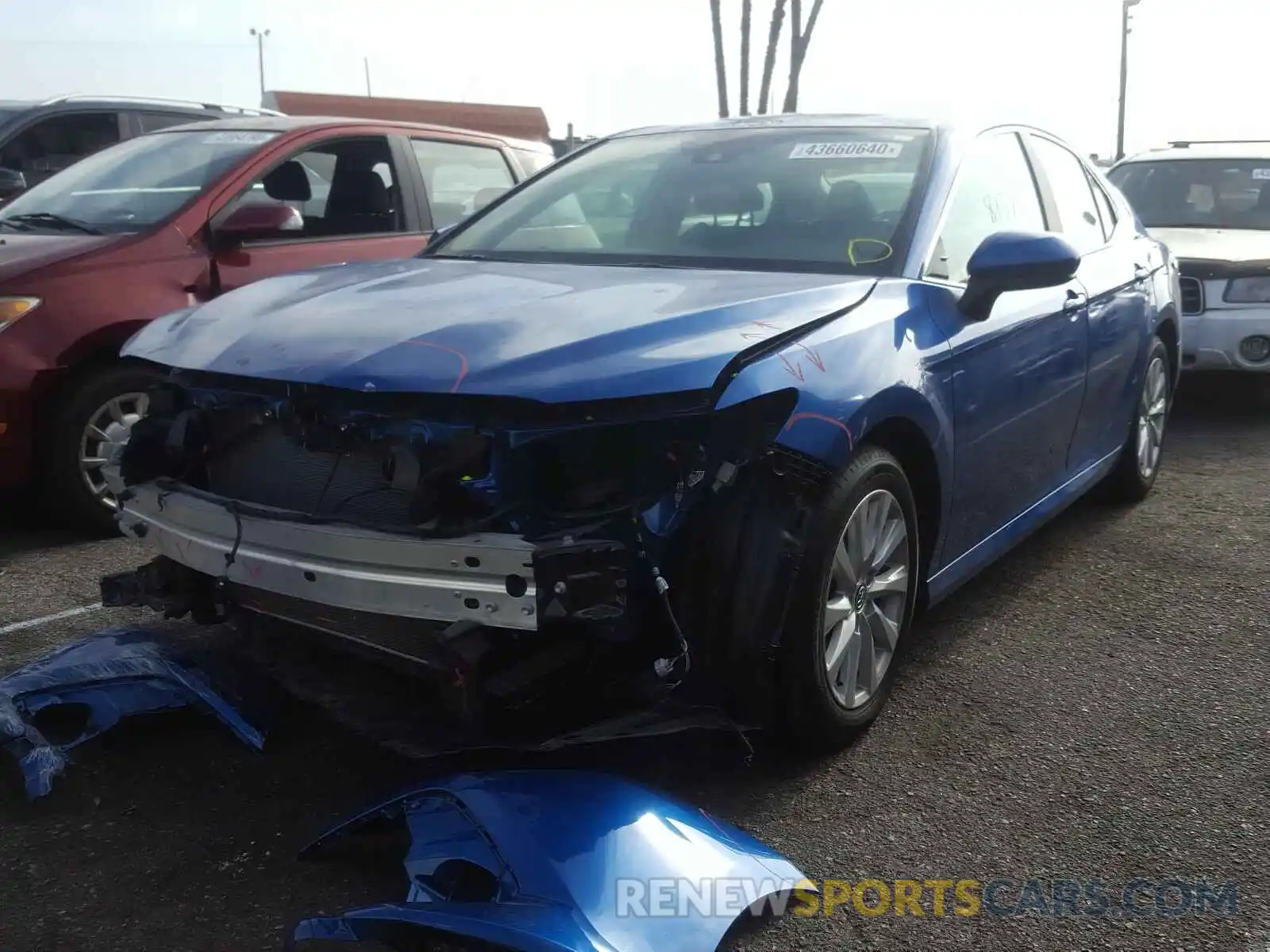 2 Photograph of a damaged car 4T1B11HK5KU285285 TOYOTA CAMRY 2019