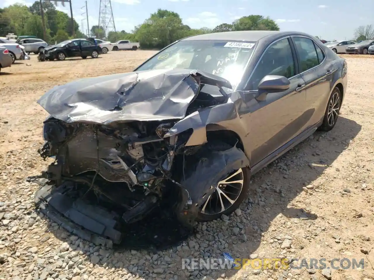 2 Photograph of a damaged car 4T1B11HK5KU295136 TOYOTA CAMRY 2019