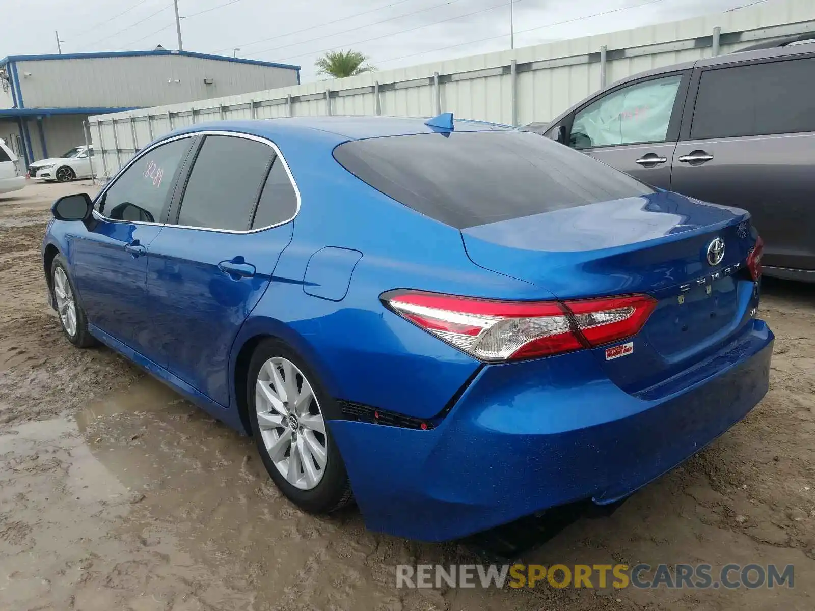 3 Photograph of a damaged car 4T1B11HK5KU299610 TOYOTA CAMRY 2019