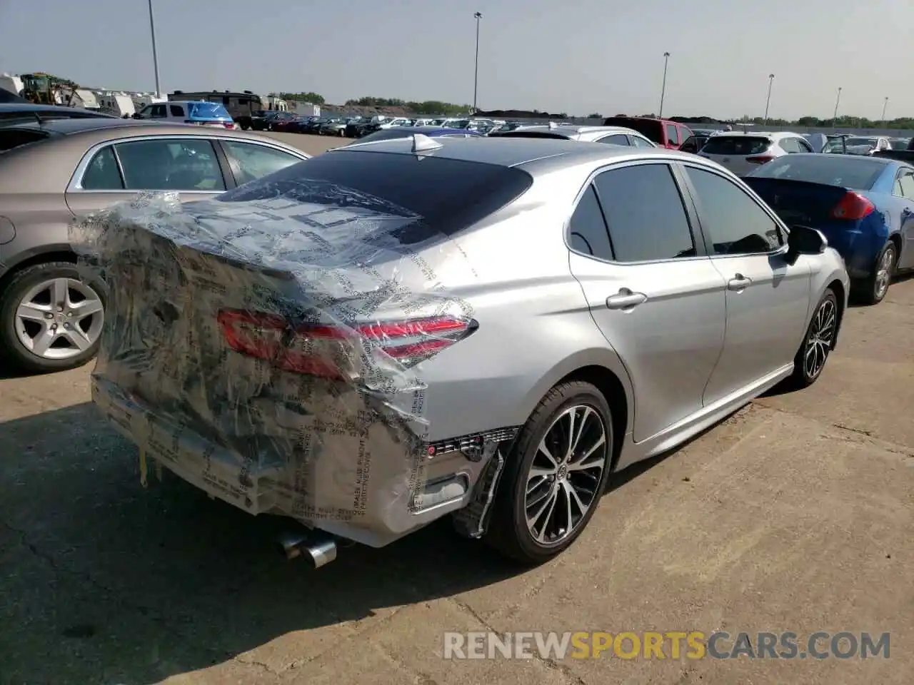 4 Photograph of a damaged car 4T1B11HK5KU680583 TOYOTA CAMRY 2019