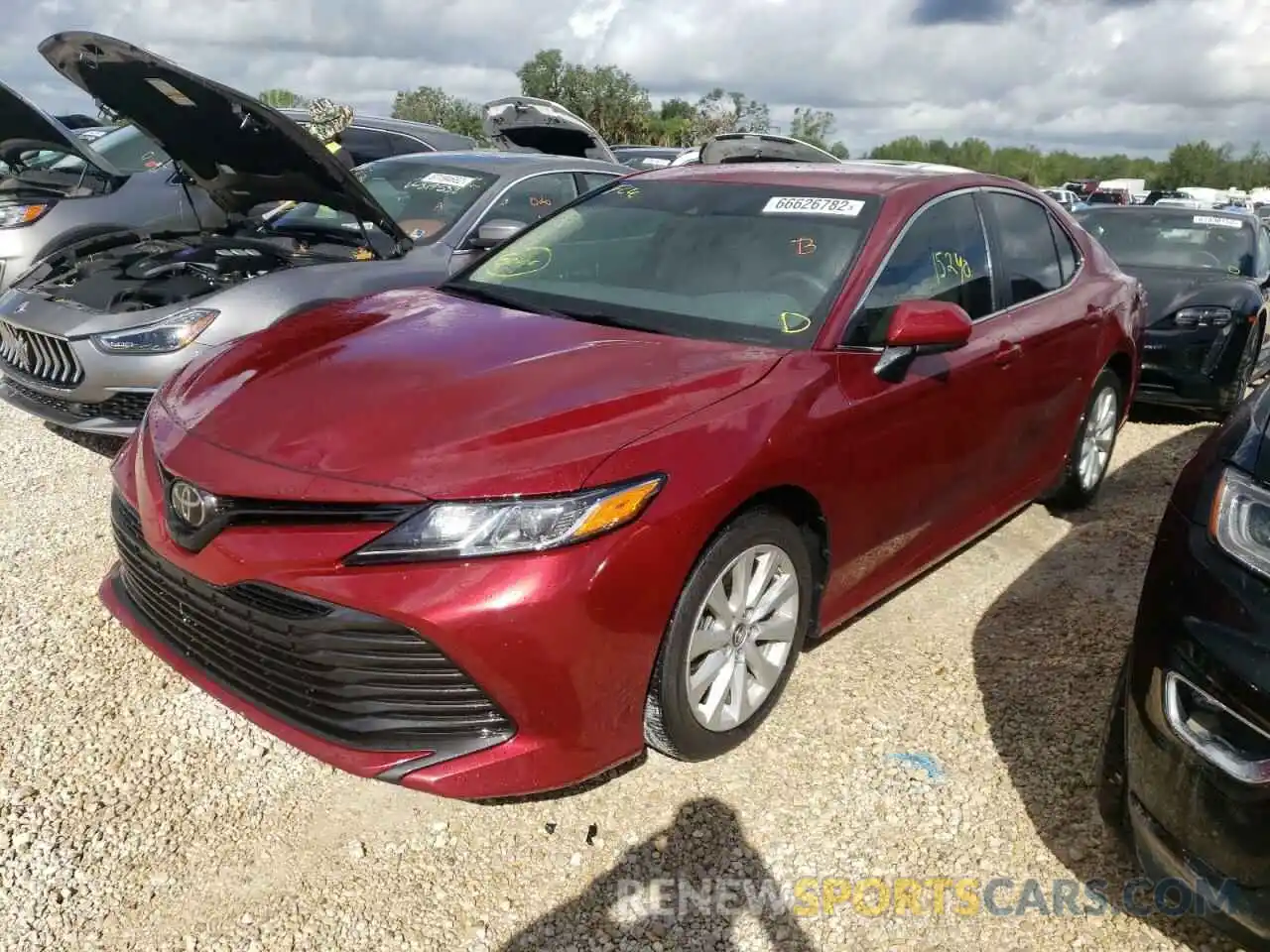 2 Photograph of a damaged car 4T1B11HK5KU693351 TOYOTA CAMRY 2019