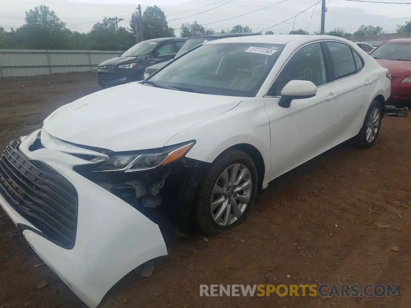 2 Photograph of a damaged car 4T1B11HK5KU696203 TOYOTA CAMRY 2019