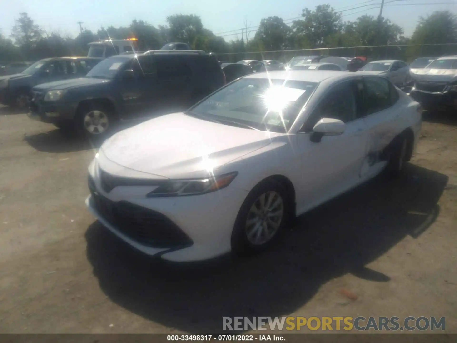 2 Photograph of a damaged car 4T1B11HK5KU696461 TOYOTA CAMRY 2019