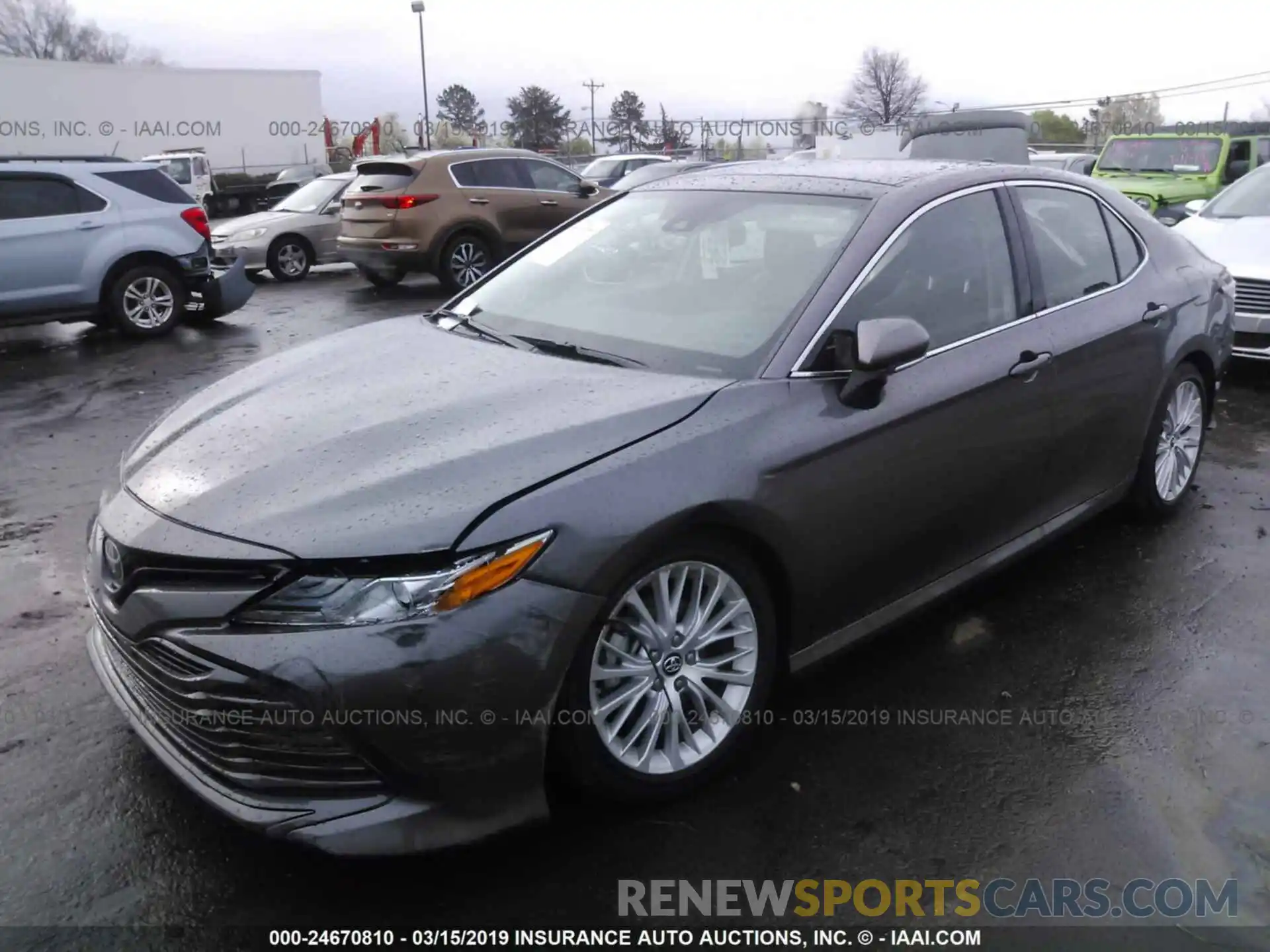 2 Photograph of a damaged car 4T1B11HK5KU703103 TOYOTA CAMRY 2019