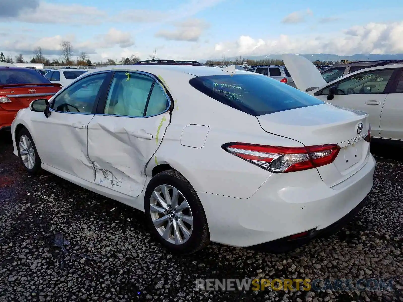 3 Photograph of a damaged car 4T1B11HK5KU708060 TOYOTA CAMRY 2019